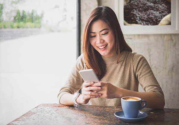 A woman using her mobile phone